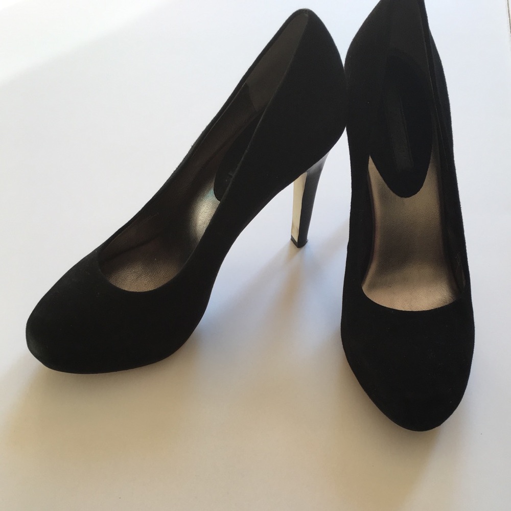 Gorgeous and timeless. Like new black suede heels.